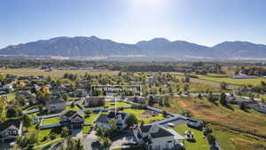 Aerial view of residential area featuring a mountain backdrop