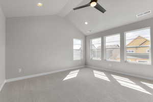 Carpeted spare room with lofted ceiling, recessed lighting, and ceiling fan