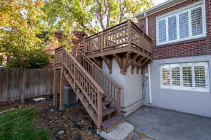 Stairs leading down to back patio.