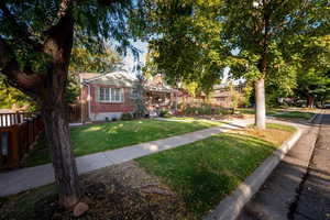 Charming all-brick bungalow-cottage on a tree-line street.