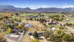 Overview of rural landscape with a mountain backdrop