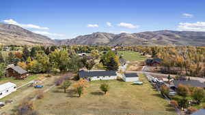 View from above of property featuring a mountainous background
