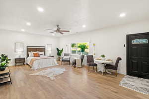 Bedroom with recessed lighting, light wood-style flooring, and ceiling fan