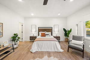 Bedroom with recessed lighting, light wood-type flooring, and a ceiling fan