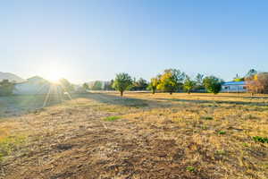 View of yard with a view of countryside