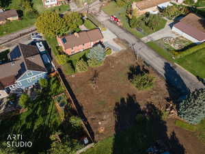 Aerial view of property's location featuring nearby suburban area