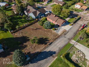 View of property location with nearby suburban area