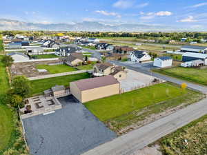 Aerial view of residential area featuring a mountainous background