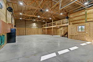 Garage with freestanding refrigerator