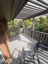 View of wooden deck off primary bedroom