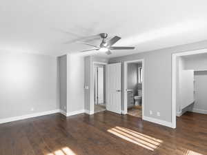 Primary bedroom with en suite bathroom and walk in closet