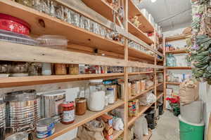 View of storage under front porch