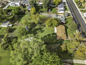 Aerial overview of property's location with nearby suburban area and a large body of water
