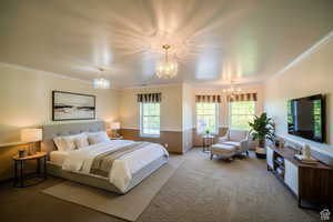 Carpeted bedroom featuring ornamental molding, a chandelier, and a textured ceiling