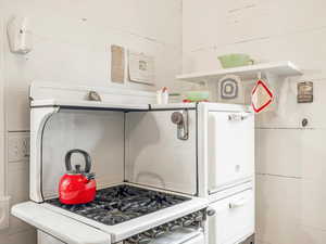 Mother in-law Kitchen with white range with gas stovetop