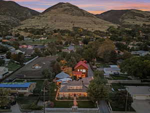 Aerial view at dusk of a mountain view and a residential view
