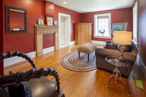 Warm interior space featuring polished wood flooring