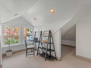 Office featuring vaulted ceiling, light carpet, and recessed lighting