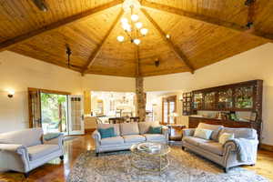 Vaulted wood-paneled ceiling with exposed beams