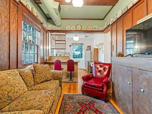 Barn Living room featuring light wood-style floors and crown molding