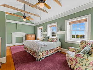 Primary Bedroom featuring hardwood / wood-style flooring and a ceiling fan