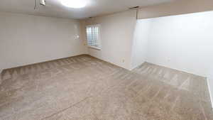 Empty room featuring carpet