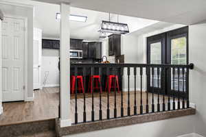 Dining area with wood finished floors and baseboards