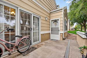 Patio with access from living room and primary bedroom.