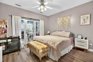 Primary bedroom with en-suite and walk out to patio