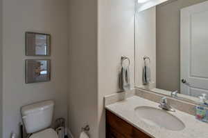 Bathroom with vanity and toilet