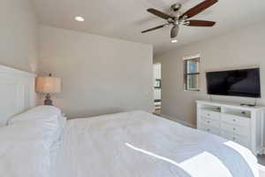 Bedroom featuring recessed lighting and a ceiling fan