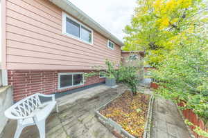 Wooden deck with a patio area