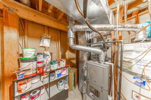 Utility room with gas water heater
