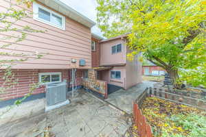 Back of house with a patio