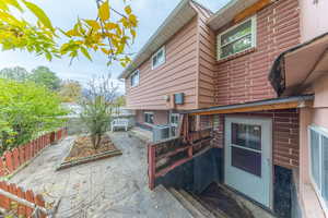 Fenced backyard featuring a patio