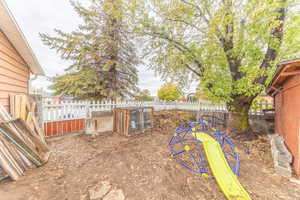 View of fenced backyard