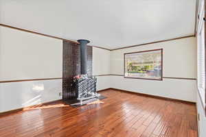 Den with wood burning stove