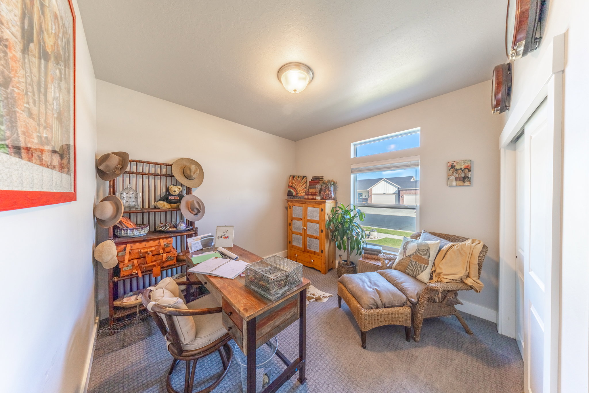 Office space featuring carpet flooring and baseboards