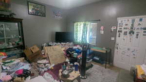 Bedroom featuring cooling unit