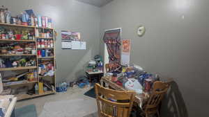 Dining space with light tile patterned floors