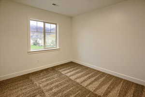 Bedroom #3  with carpet and baseboards