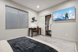 Bedroom featuring baseboards and recessed lighting