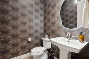 Bathroom with toilet and a sink