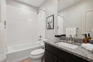Full bath with vanity and washtub / shower combination