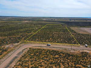 Aerial view of sparsely populated area with property boundaries highlighted