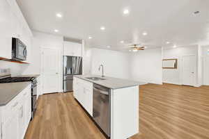 Empty living room / kitchen area