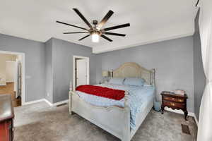 Bedroom with carpet floors and ceiling fan