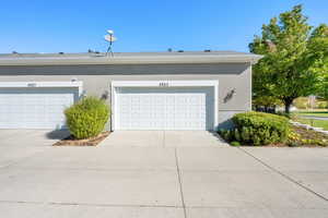 Garage with concrete driveway