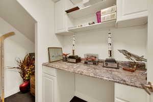 Craft room with white cabinets
