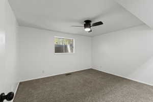 Bedroom with carpet flooring and ceiling fan